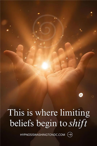 Hands glowing with golden light symbolizing hypnosis releasing limiting believe and inner transformation at Washington DC Hypnosis Center