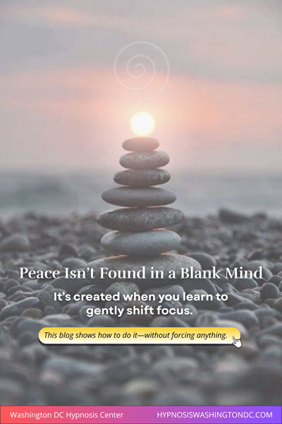 A stack of balanced stones glowing with sunrise light, symbolizing mental clarity and gentle focus through hypnosis.