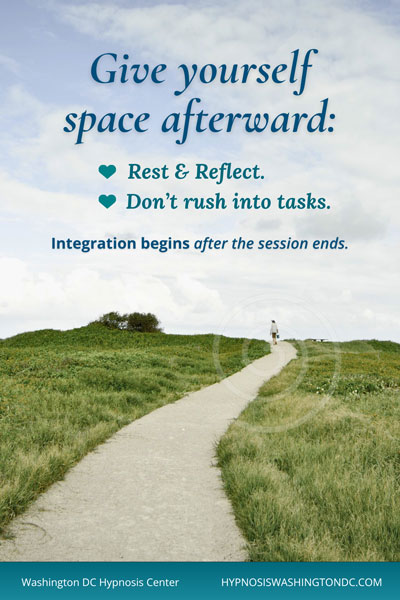 Peaceful path through green fields with person walking ahead, symbolizing reflection, rest, and integration after hypnosis session.