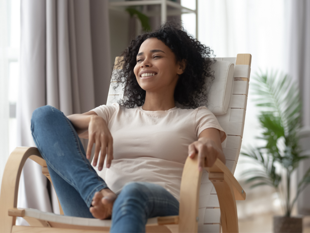 Woman relaxed and at ease after working through anxiety with hypnosis